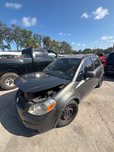 2010 Suzuki SX4 Location - Imports - Row 16 - Stock # H53704