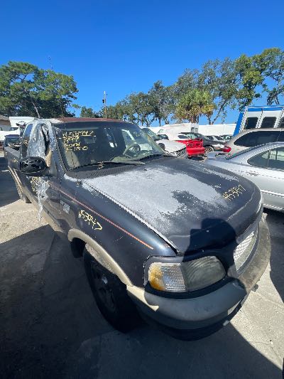1999 Ford F-150 Location - Large Trucks & Vans - Row 32 - Stock # H53947