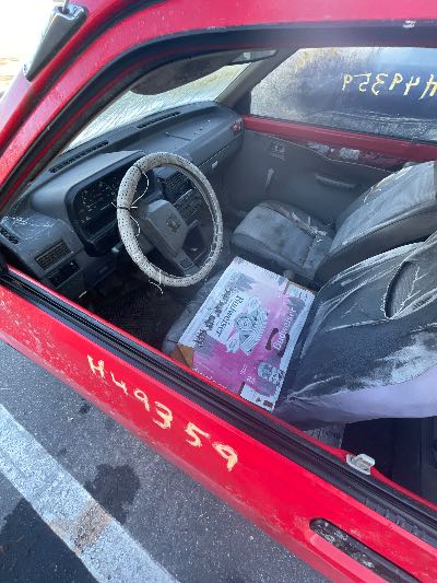 1991 Ford Festiva Location - Ford - Row 33 - Stock # H49359