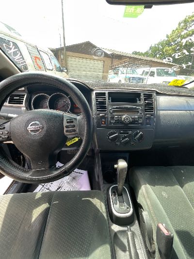 2012 Nissan Versa Location - Imports - Row 5 - Stock # H49438