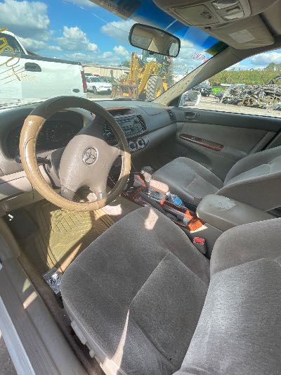 2004 Toyota Camry LE FWD 4D Sedan 2.4 4cyl. Location - Imports - Row 14 - Stock # H49701