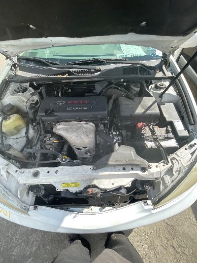 2004 Toyota Camry LE FWD 4D Sedan 2.4 4cyl. Location - Imports - Row 14 - Stock # H49701