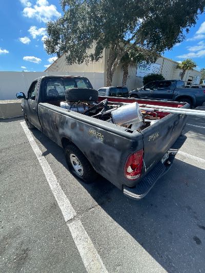 1997 Ford F-150 Location - Large Trucks & Vans - Row 48 - Stock # H49896