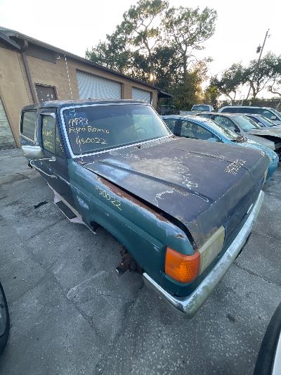 1989 Ford Bronco Location - Large Trucks & Vans - Row 50 - Stock # H50022