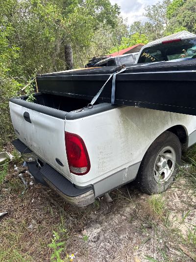 1998 Ford F-150 Location - Large Trucks & Vans - Row 27 - Stock # H48527