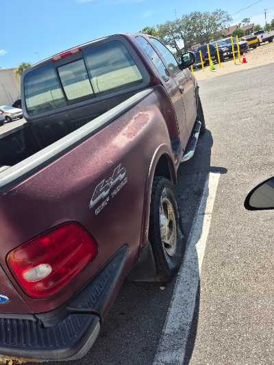 1997 Ford F-150 Location - Large Trucks & Vans - Row 23 - Stock # H49065