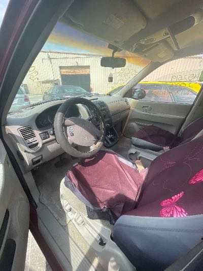 2004 Kia Sedona Location - Imports - Row 9 - Stock # H52619