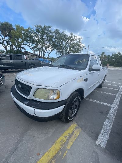 2003 Ford F-150 Location - Large Trucks & Vans - Row 14 - Stock # H53035