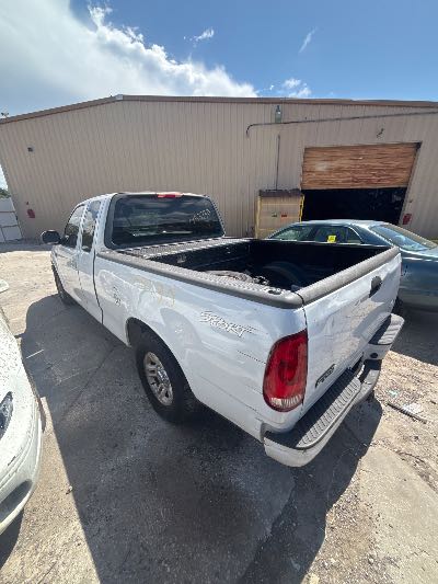 2003 Ford F-150 Location - Large Trucks & Vans - Row 27 - Stock # H53730